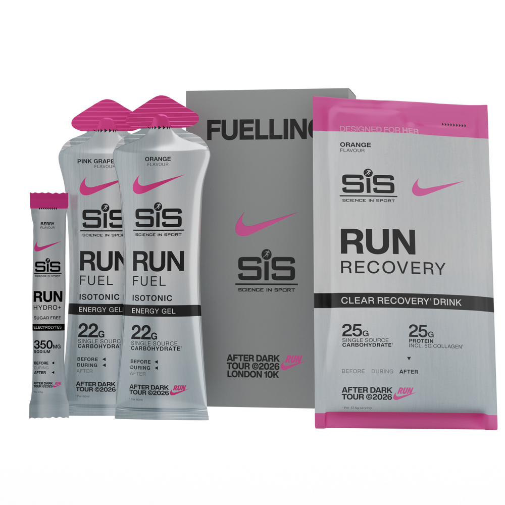 A set of sports nutrition products from SIS Science in Sport, including two 22g energy gel packets, a single 350g stick packet, a large box, and a 25g powder recovery drink pouch, all in a clean studio shot.