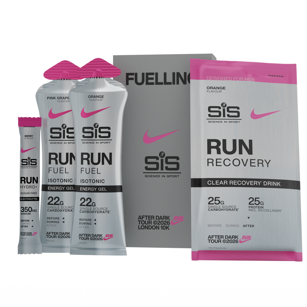 A set of sports nutrition products from SIS Science in Sport, including two 22g energy gel packets, a single 350g stick packet, a large box, and a 25g powder recovery drink pouch, all in a clean studio shot.