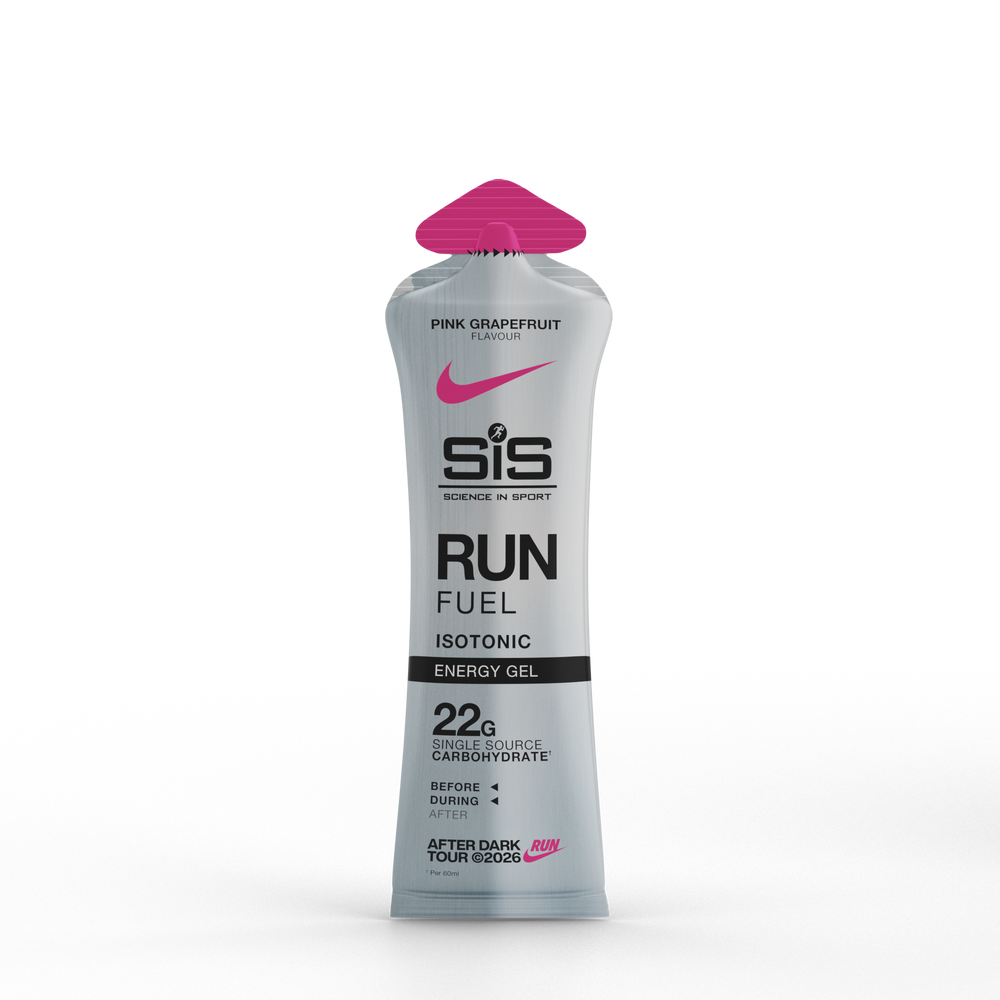 A squeeze tube of SIS Running in Sport Run Fuel Isotonic Energy Gel in pink grapefruit flavor, featuring a metallic silver body, black text, and a bright pink cap, set against a plain white background.